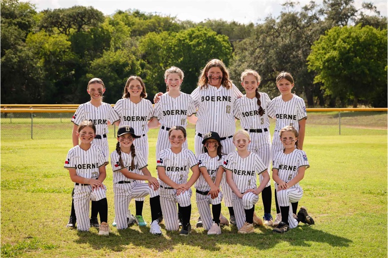 A Boerne softball team in pinstripe uniforms